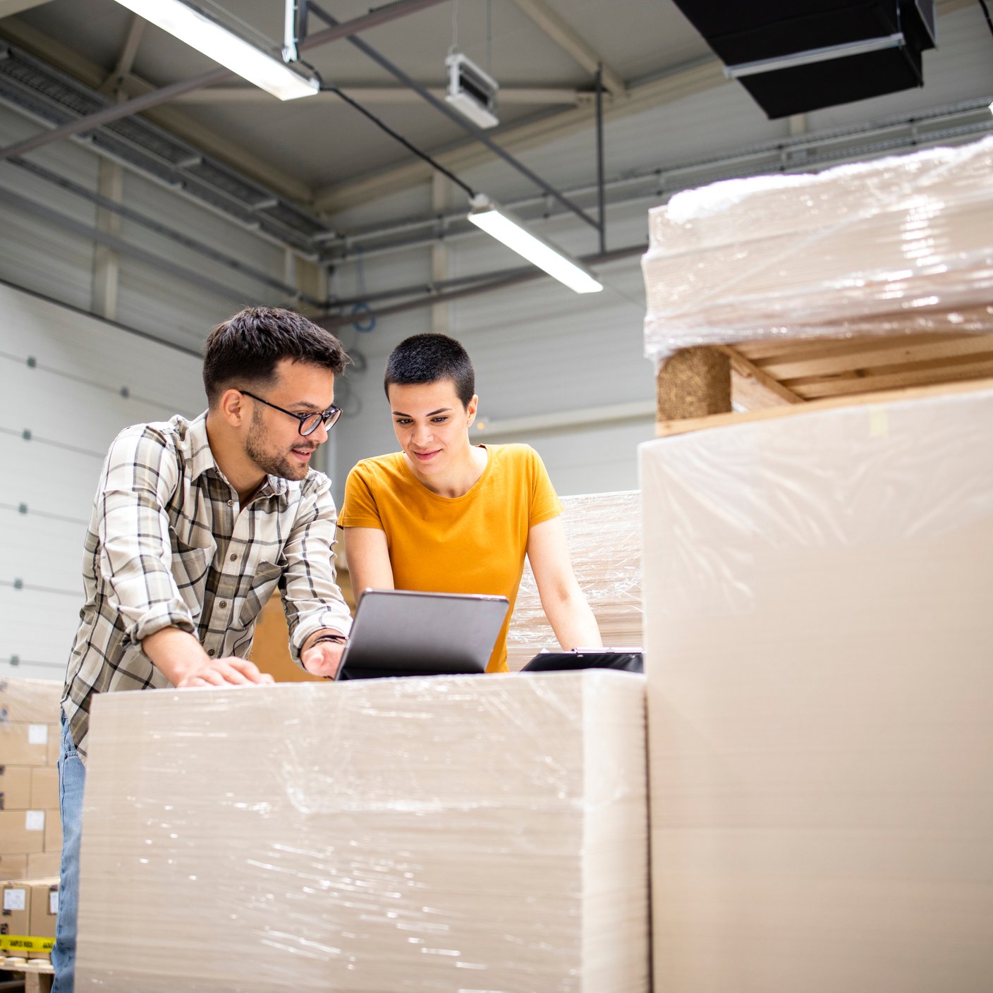 Creative designers discussing about graphics in printing shop