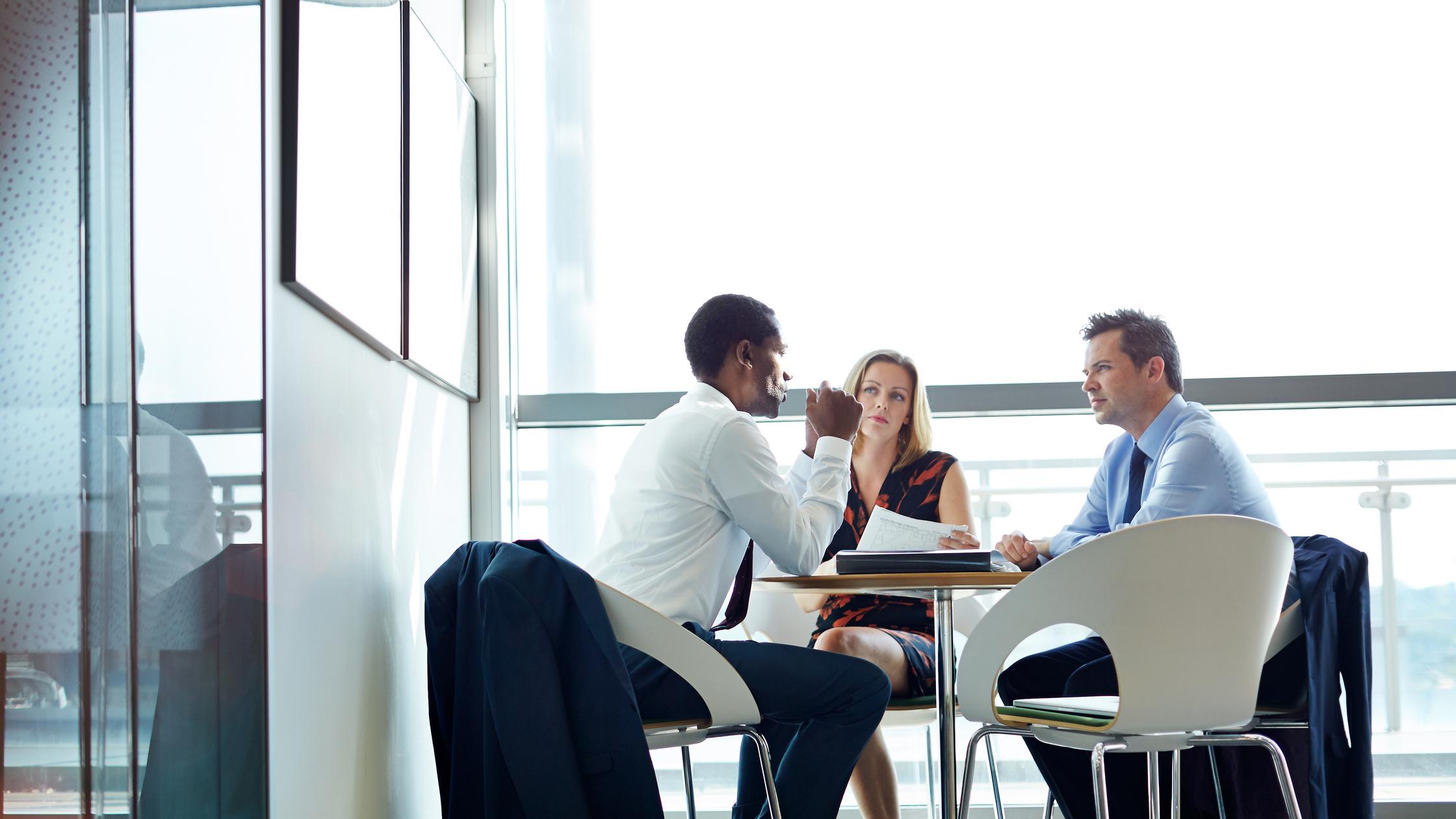 Shot of a group of businesspeople having a meeting in an office (cropped)