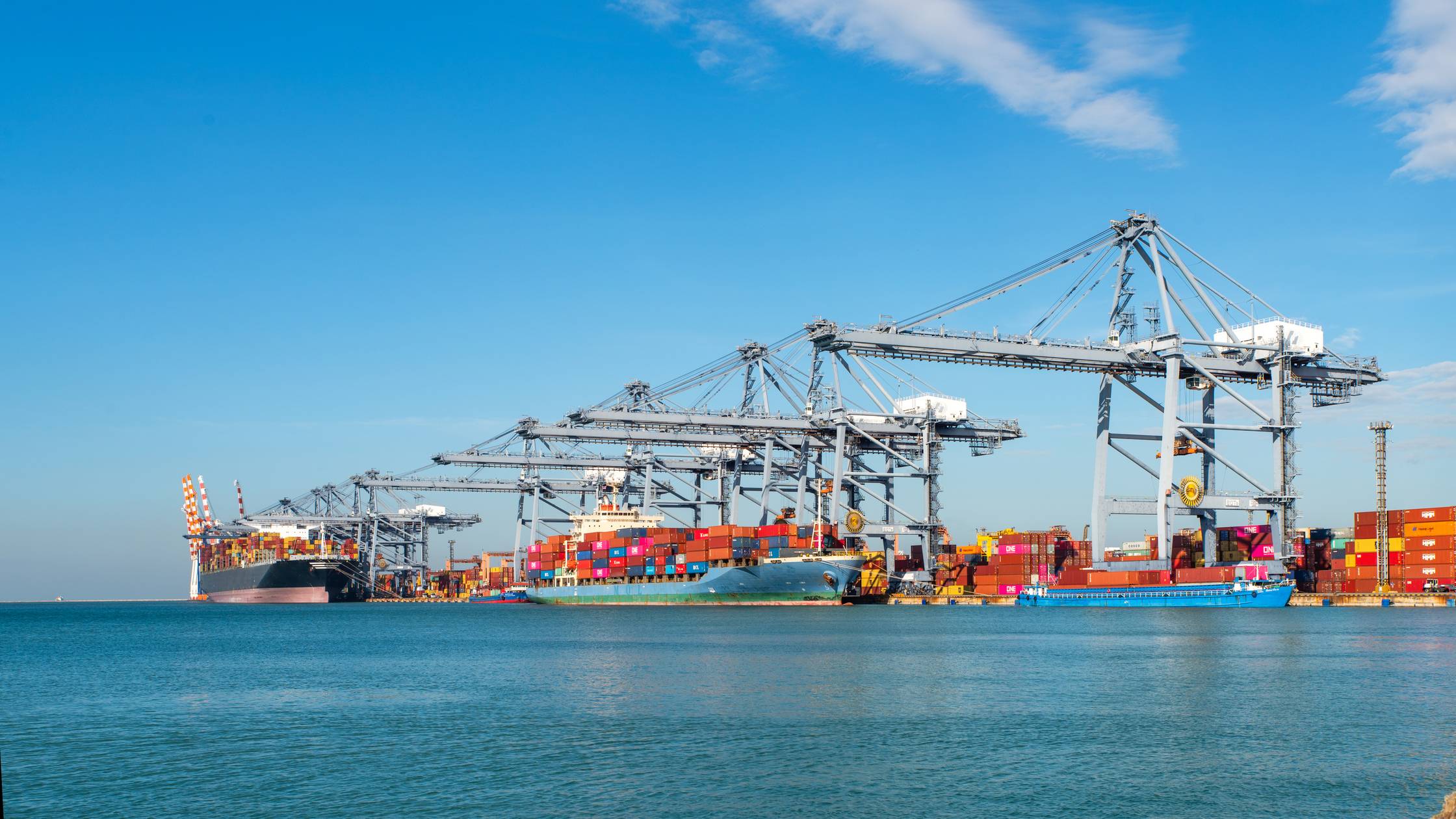 Container ship loading and unloading in sea port